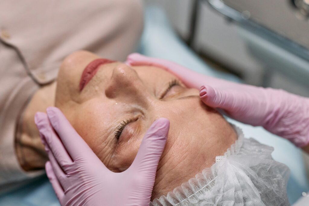 Woman preparing for rejuvenating skin treatment highlighting exosomes, stem cells, and LONGEVEX™ therapy.